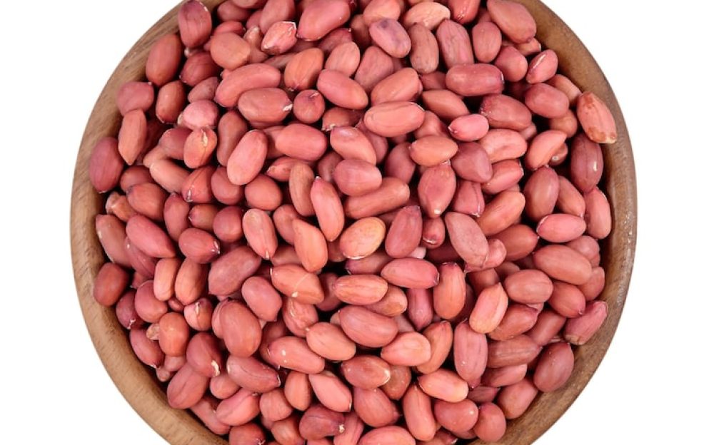 peeled-peanuts-wooden-bowl-white-background_492824-998